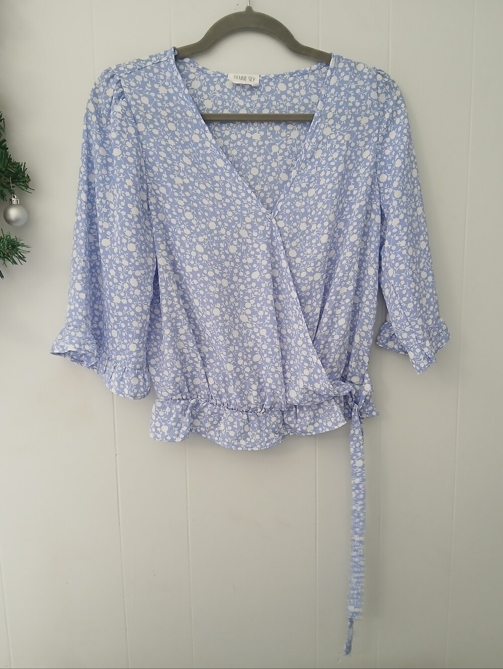 Sienna Sky Light Blue Floral Wrap Blouse